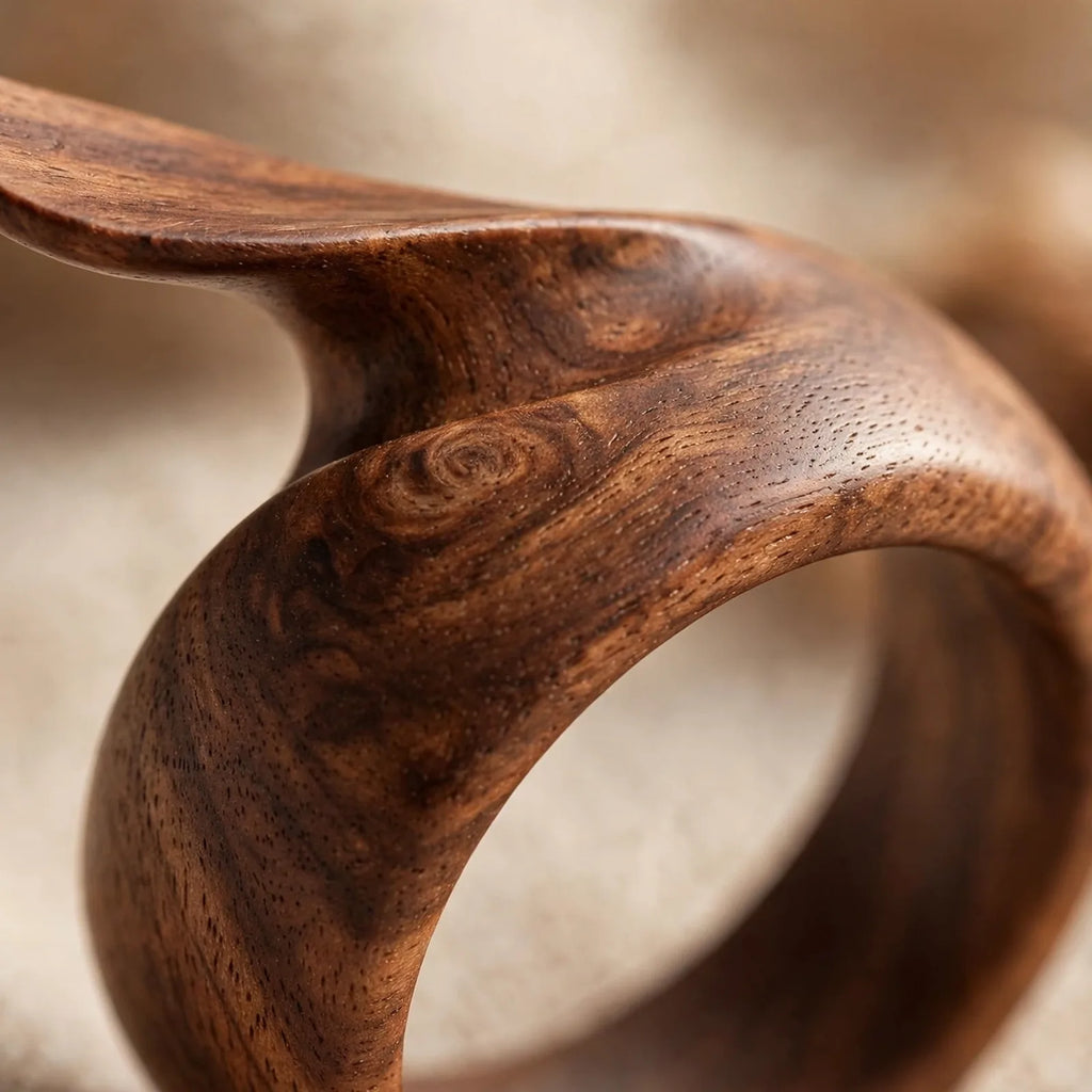 Close-up of natural walnut wood grain on thumb page holder ring